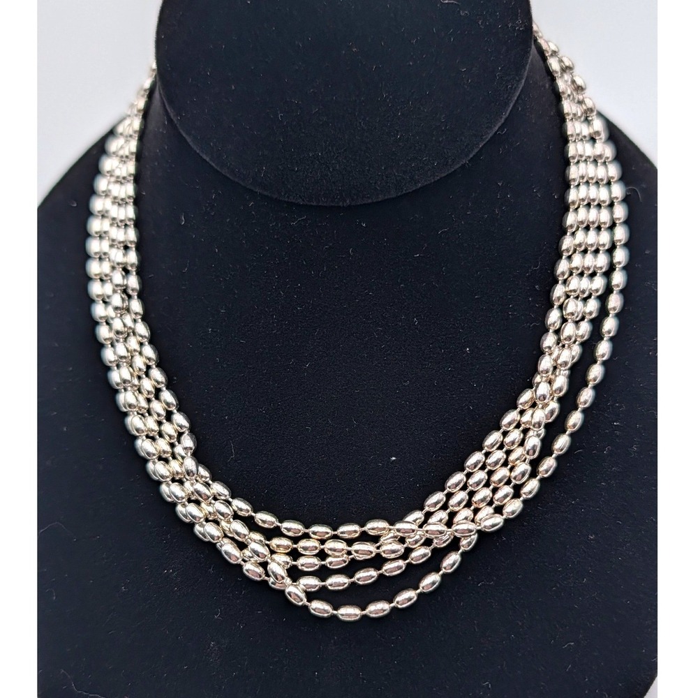 Silver Tone Multi Strand Bead Necklace Four Layer Oval Bead Draped Lobster Clasp